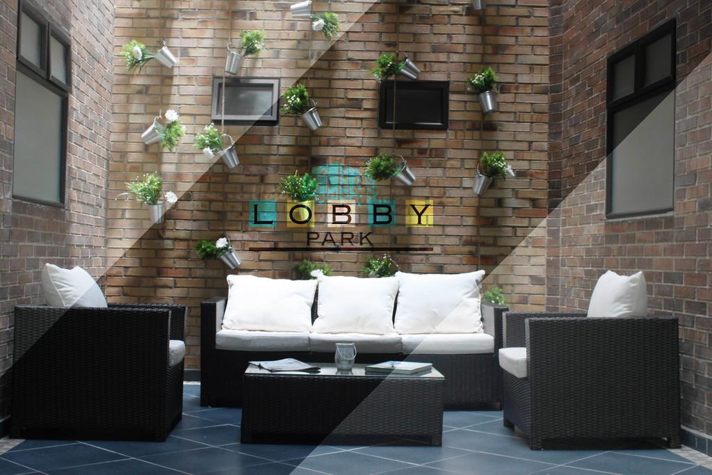 Lobby Park Hotel Medellin Bagian luar foto